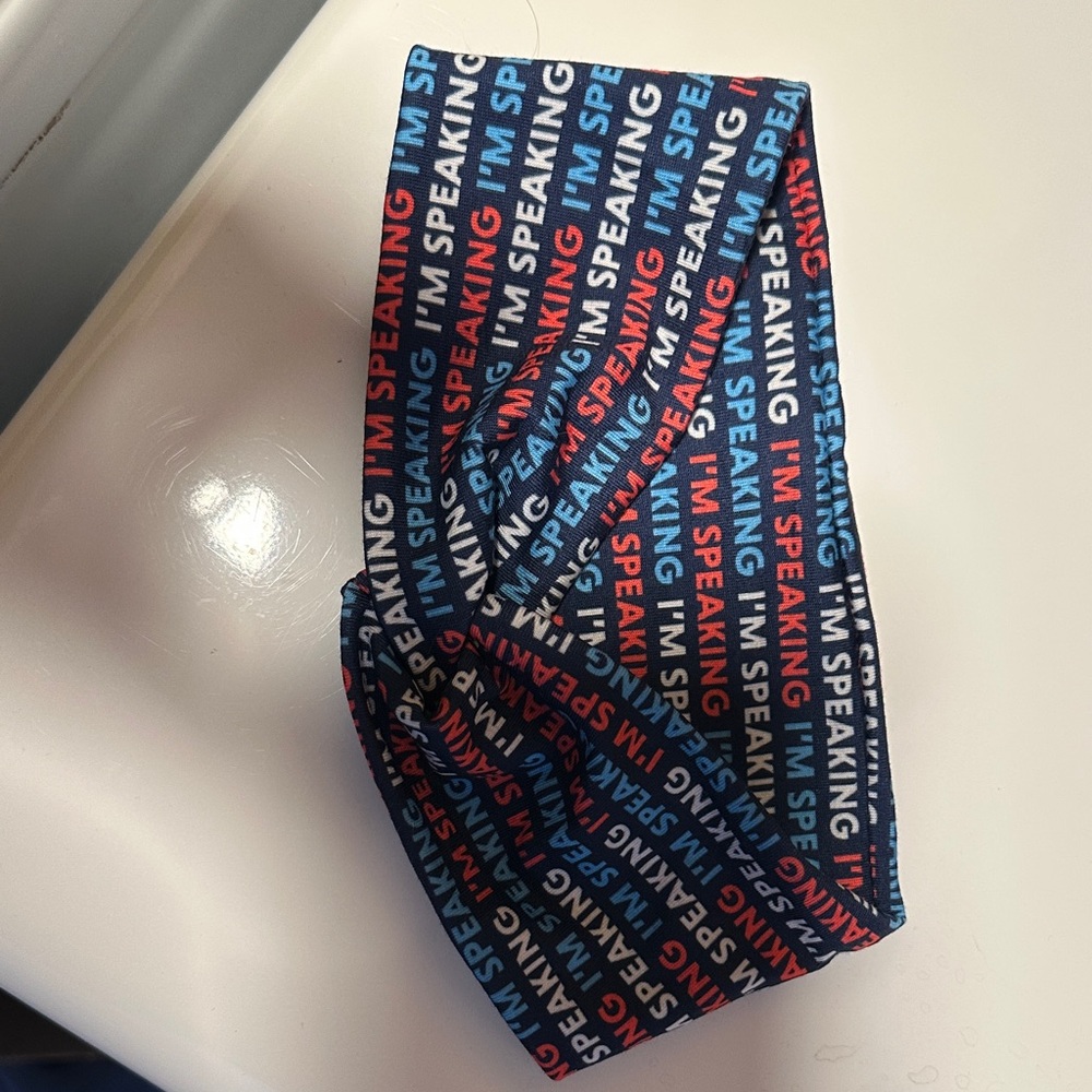 New headband never worn! I'm Speaking.